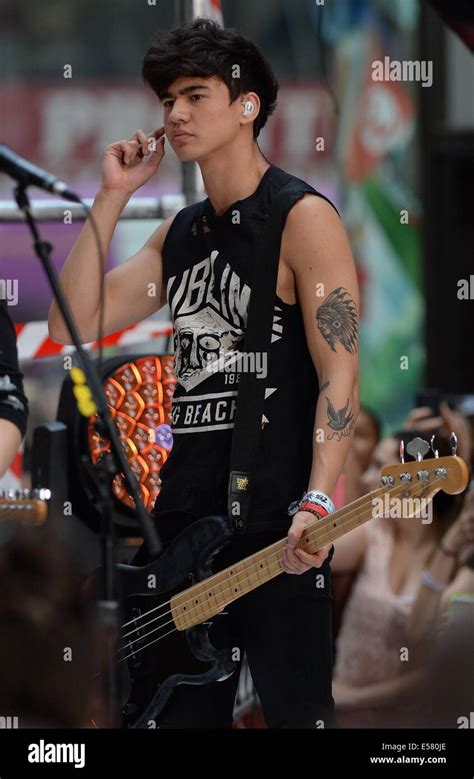 calum hood 2014|Calum Hood of 5 Seconds of Summer performs onstage during。